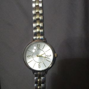 Silver and gold watch